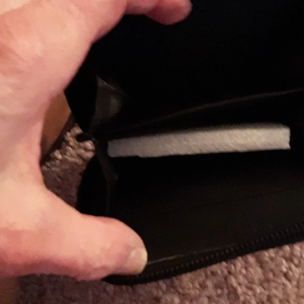 NWOT  Nightmare Before Christmas short wallet with zippered closure.